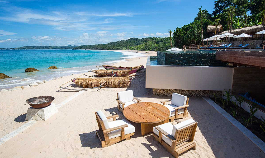 Modern bistro interior with geometric pendant lights and warm ambiance