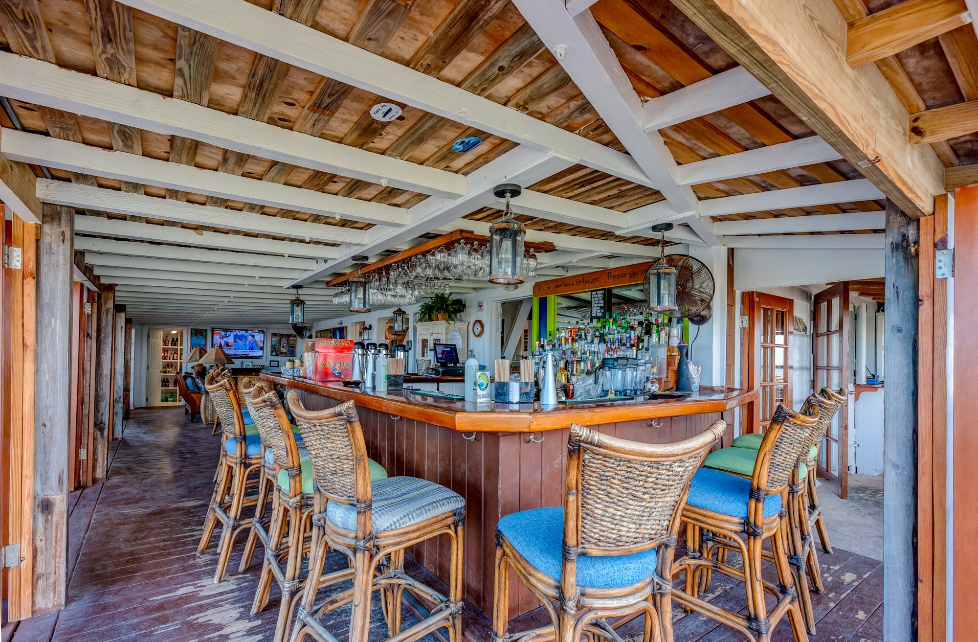 Modern bistro interior with geometric pendant lights and warm ambiance