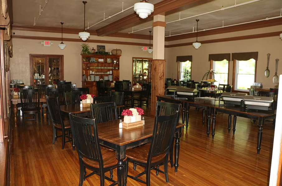 Modern bistro interior with geometric pendant lights and warm ambiance