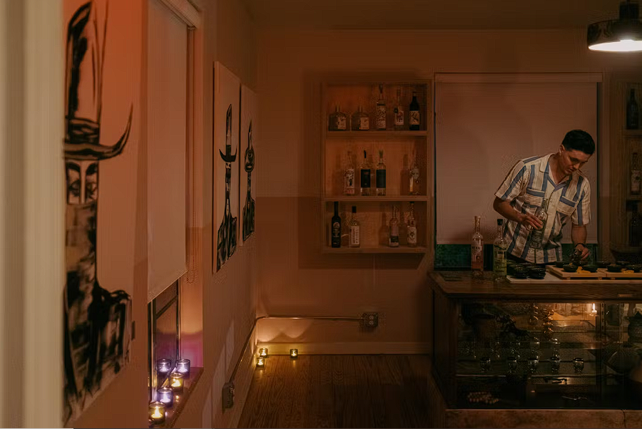 Modern bistro interior with geometric pendant lights and warm ambiance