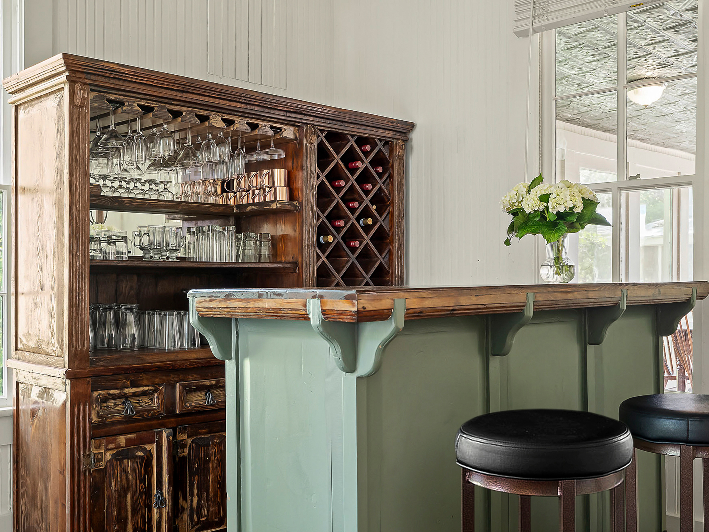 Modern bistro interior with geometric pendant lights and warm ambiance