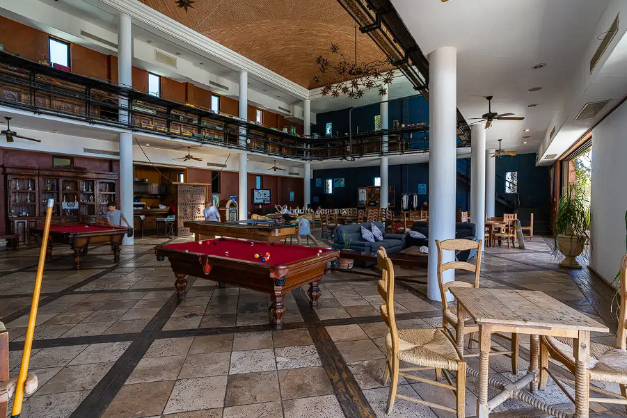 Modern bistro interior with geometric pendant lights and warm ambiance