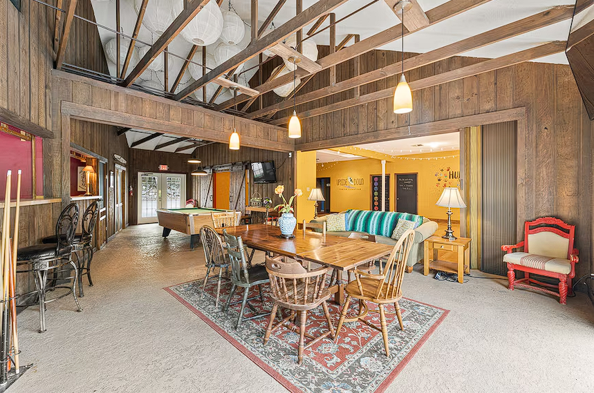 Modern bistro interior with geometric pendant lights and warm ambiance