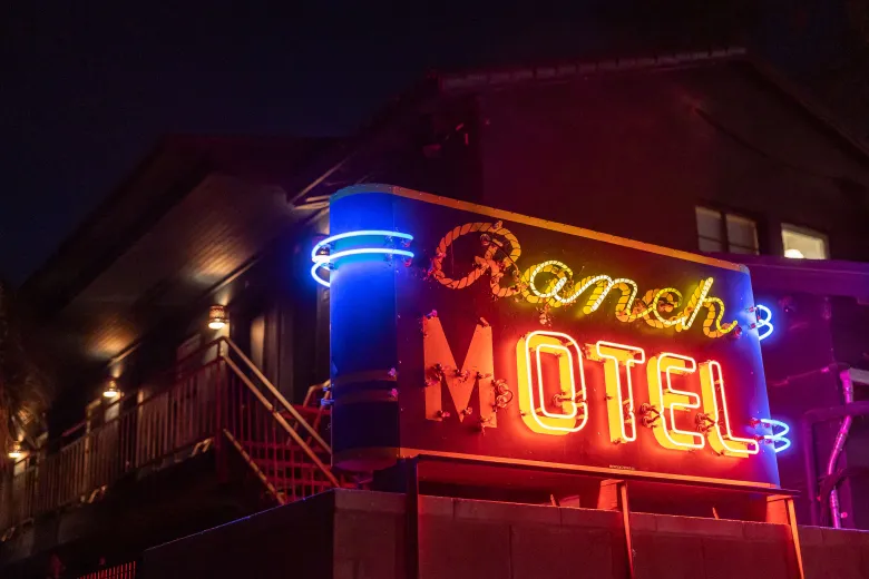 Modern bistro interior with geometric pendant lights and warm ambiance