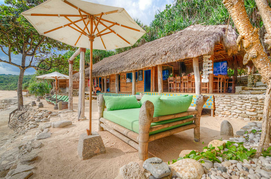 Modern bistro interior with geometric pendant lights and warm ambiance